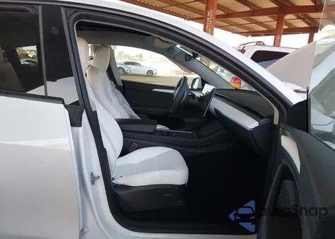 2024 Tesla Model Y Long Range Dual Motor All-Wheel Drive from USA, damaged, VIN 7SAYGAEE2RF122644